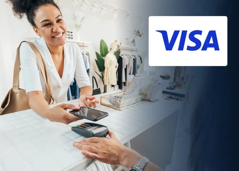 Happy woman using prepaid Visa Incentive card in store with her phone.