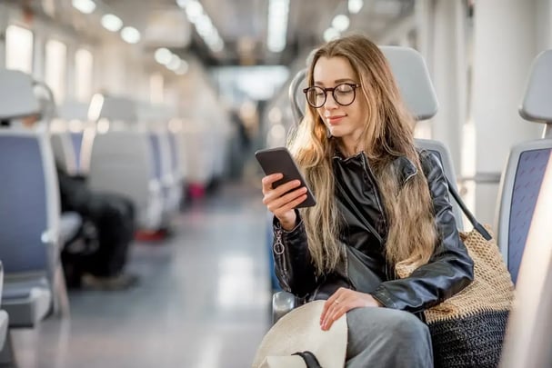 woman on phone on train